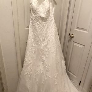 Brand new wedding dress. $400 OBO.